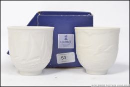 2 Lladro collectors editions white porcelain cups,