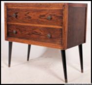 A vintage mid 20th century oak chest of drawers,
