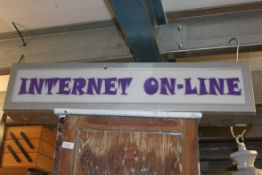 A retro late 20th century illuminated shop Industrial sign.