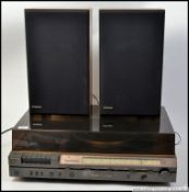 A stunning retro late 1960's Hitachi SDT 7802R stereo system, having a built in tuner,