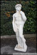 A large good quality 20th century stone garden ornament of Adonis being well carved and raised on