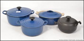 A collection of Le Crueset cook wares to include pans etc in blue ( see illustrations ).
