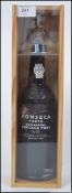 A cased bottle of Fonseca Porto Guimaraeans Vintage 1986 Port.
