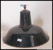 A mid century Industrial metal enamel painted black pendant factory light shade.