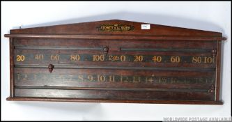 Early 20th century mahogany snooker scoring board bearing notation for J Bennett & Co.