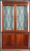 A good quality large mahogany adams revival library bookcase cabinet.