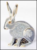 A Royal Crown Derby large paperweight Star Light Hare exclusive to the collectors guild with gold