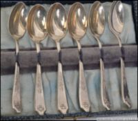 A cased set of 6 silver hallmarked spoons complete in the presentation box.
