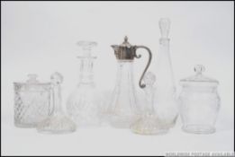 A collection of cut glass and crystal to include decanters,