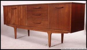 A retro 1970's Teak wood Danish influence sideboard dresser.