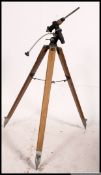A mid century Industrial wooden tripod stand with original fixings atop - ideal as a conversion to