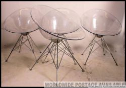 A set of Four Eros Kartell Transparent Plastic Chairs, designed by Philippe Starck for Kartell,