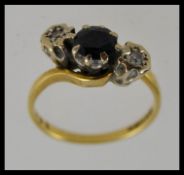 A ladies 9ct gold sapphire and diamond ring,