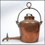 A large Victorian copper fireplace kettle cauldron with cast iron handle and oversize spout with