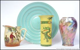 A group of ceramics to include a large Poole pottery plate marked 971 to base ,