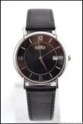 A gentlemans Roamer black faced swiss vintage gentlemans wristwatch.