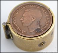 A charming trench art style open top cigarette lighter.