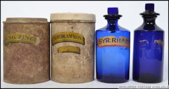 A pair of 19th century apothecary jars with notation to the front,