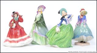 Royal Doulton figures to include Autumn Breezes HN1913, The Paisley Shawl HN1460 ( A/F ),