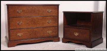 An excellent quality Stag ( Georgian style ) mahogany chest of drawers and bedside cabinet being
