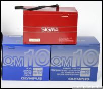 A matching pair of working Olympus OM10 35mm camera bodies,