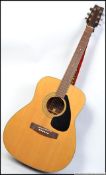 A 20th century acoustic Yamaha FG-160 steel string acoustic guitar complete with a vinyl carry case