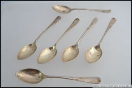 A set of 6 silver hallmarked fiddle pattern tea spoons bearing hallmarks for Gm Co, Birmingham,