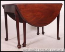 A 19th century mahogany pad feet drop leaf / gate leg dining table.