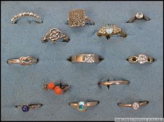 13 ladies white metal costume jewellery / dress rings