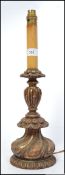 A stunning 20th century carved gilt wood table lamp