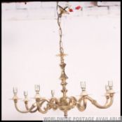 A 20th Century 8 branch brass ceiling hanging light