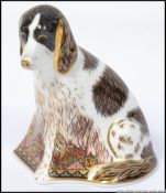 A Royal Crown Derby paperweight Molly , collectors guild exclusive with gold stopper.