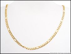 A good quality ladies 18ct gold Figaro chain link necklace 47cm in length and weighing 10g