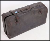 A vintage early to mid 20th century leather Gladstone Bag / Suitcase,