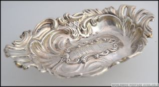 A late Victorian silver hallmarked bon bon dish with central notation for 1898 having Birmingham