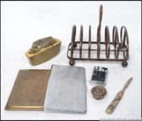 A silverplate toast rack of large form with markings for Pleasance & Harper.