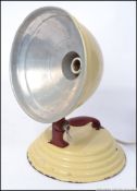 A vintage Barber desktop beige and red heat lamp ideal as a conversion to a desk lamp.