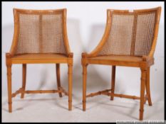 A pair of contemporary matching 20th century framed bergere tub chairs, with bow seats,