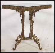 A 20th century vintage gilt cast metal coffee table base,