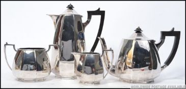 A good quality silver plate tea service comprising teapot,