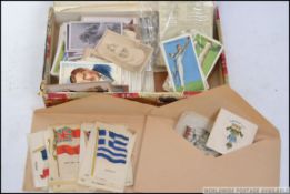 A collection of vintage cigarette cards dating from the early part of the 20th century to include