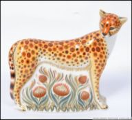 A Royal Crown Derby large paperweight Cheetah Mother limited to 950 pieces with gold stopper.