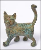 A 20th century bronze figurine of a cat in having raised tail ( see illustrations )