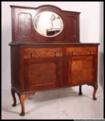 A 1930's flame mahogany mirror back sideboard.