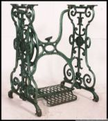 A good quality upcycled painted mid century sewing machine cast iron treadle base ideal for a