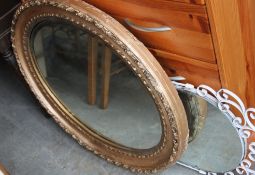 A collection of 3 x mirrors from the 20th century to include an Edwardian oval mirror,