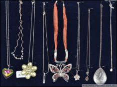 9 silver and white metal costume / dress jewellery necklaces