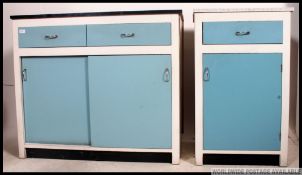 A pair of retro vintage 20th century kitchen units.