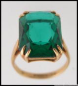 A vintage ladies 9ct gold and blue / green tourmaline stone set dress ring.
