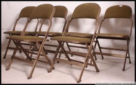 A fantastic set of 6 unusual Industrial metal folding / stacking chairs.